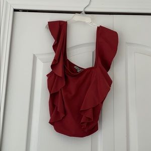 Burnt red crop top with ruffles on the side